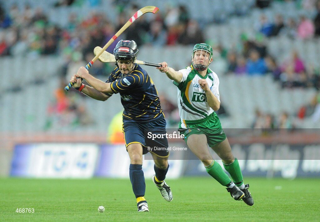 30 October 2010; Finlay Macrae, Scotland, in action against Tommy Walsh, Ireland. Senior Hurling / Shinty International 1st Test, Ireland v Scotland, Croke Park, Dublin. Picture credit: Diarmuid Greene / SPORTSFILE