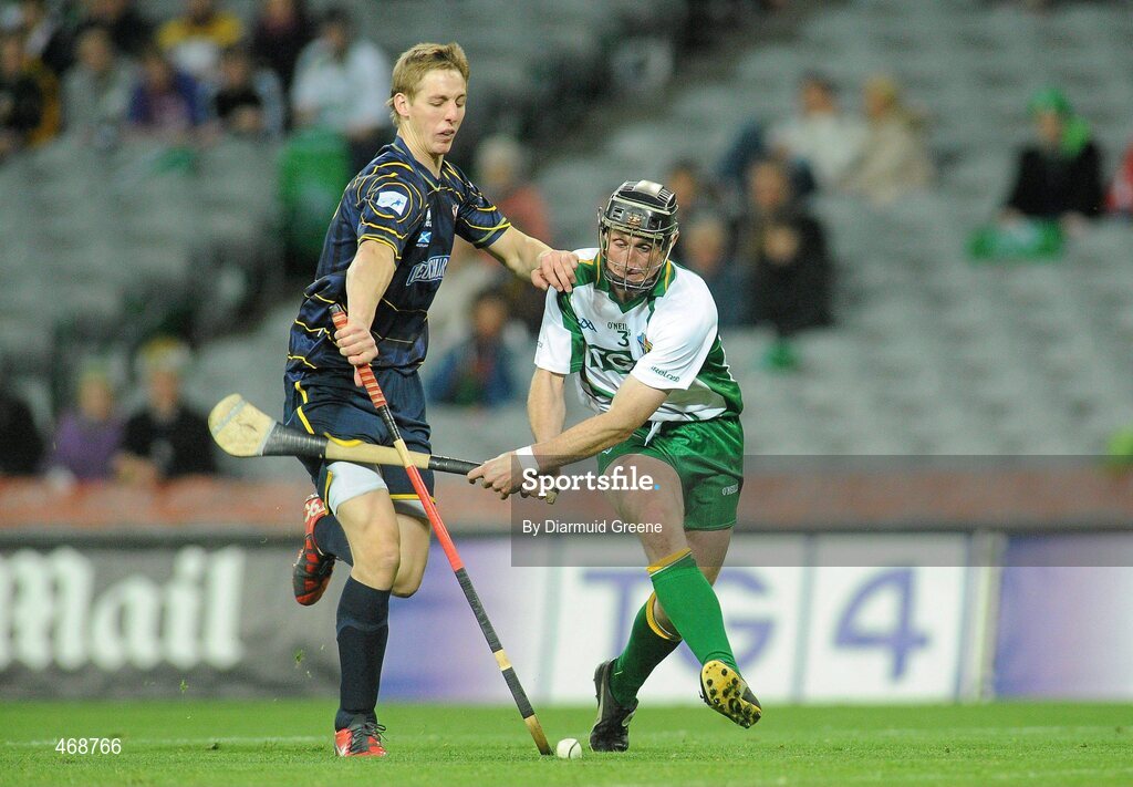 30 October 2010; Darren McCormack, Ireland, in action against Shaun Nicolson, Scotland. Senior Hurling / Shinty International 1st Test, Ireland v Scotland, Croke Park, Dublin. Picture credit: Diarmuid Greene / SPORTSFILE