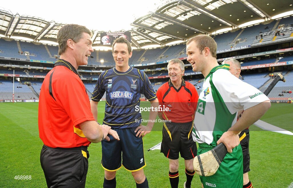 30 October 2010; Referee Tony Carroll tosses the coin between Scotland captain Gary Innes and Ireland captain Tommy Walsh before the game. Senior Hurling / Shinty International 1st Test, Ireland v Scotland, Croke Park, Dublin. Picture credit: Diarmuid Greene / SPORTSFILE