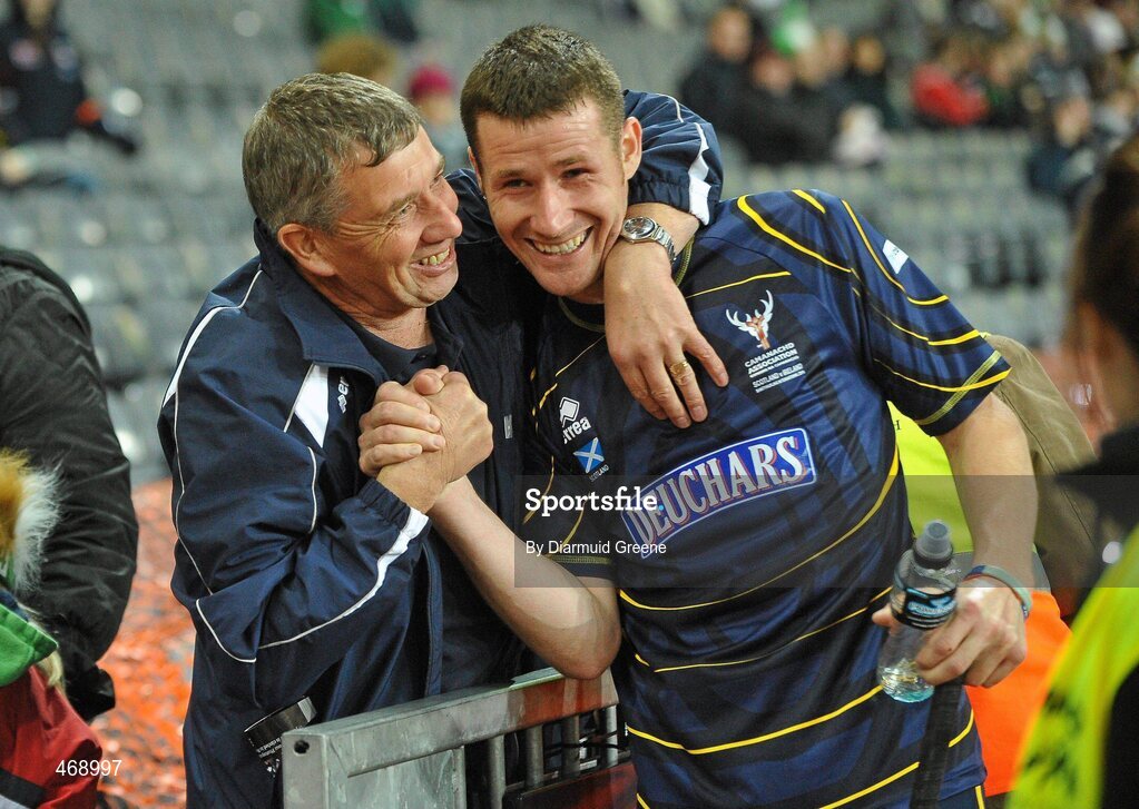 30 October 2010; Iain McDonald, Scotland, is congratulated by a supporter after the game. Senior Hurling / Shinty International 1st Test, Ireland v Scotland, Croke Park, Dublin. Picture credit: Diarmuid Greene / SPORTSFILE