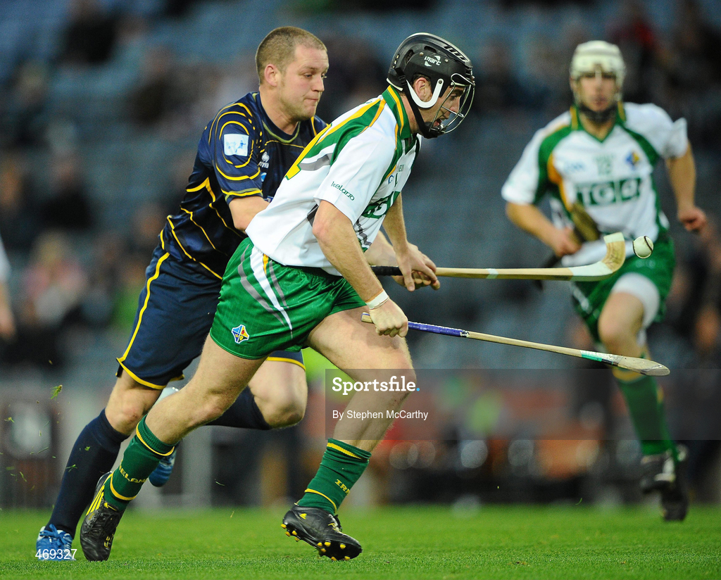 30 October 2010; Shane Dooley, Ireland, in action against Norman Campbell, Scotland. Senior Hurling / Shinty International 1st Test, Ireland v Scotland, Croke Park, Dublin. Picture credit:  Stephen McCarthy / SPORTSFILE
