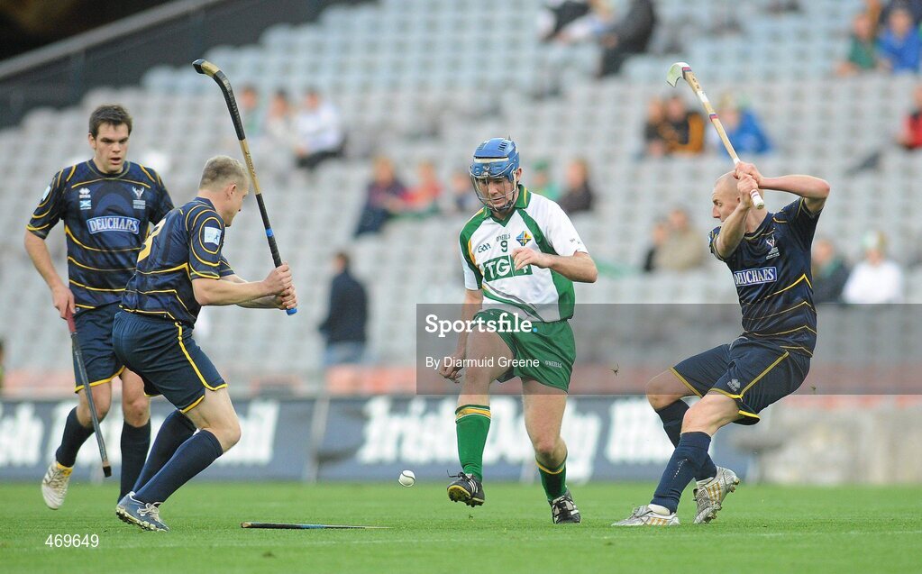 30 October 2010; Willie Hyland, Ireland, in action against Scott Campbell, left, and Paul Gow, Scotland. Senior Hurling / Shinty International 1st Test, Ireland v Scotland, Croke Park, Dublin. Picture credit: Diarmuid Greene / SPORTSFILE