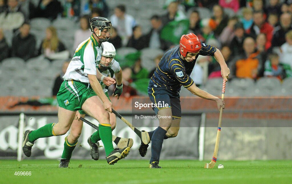 30 October 2010; Ronald Ross, Scotland, in action against Darren McCormack, Ireland. Senior Hurling / Shinty International 1st Test, Ireland v Scotland, Croke Park, Dublin. Picture credit: Diarmuid Greene / SPORTSFILE