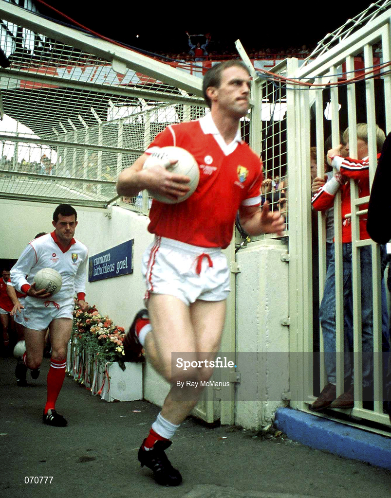 16 September 1990; Cork captain Larry Tompkins, followed by team-mate John Kerins, leads his side onto the pitch prior to the All-Ireland Senior Football Championship Final match between Cork and Meath at Croke Park in Dublin. Photo by Ray McManus/Sportsfile