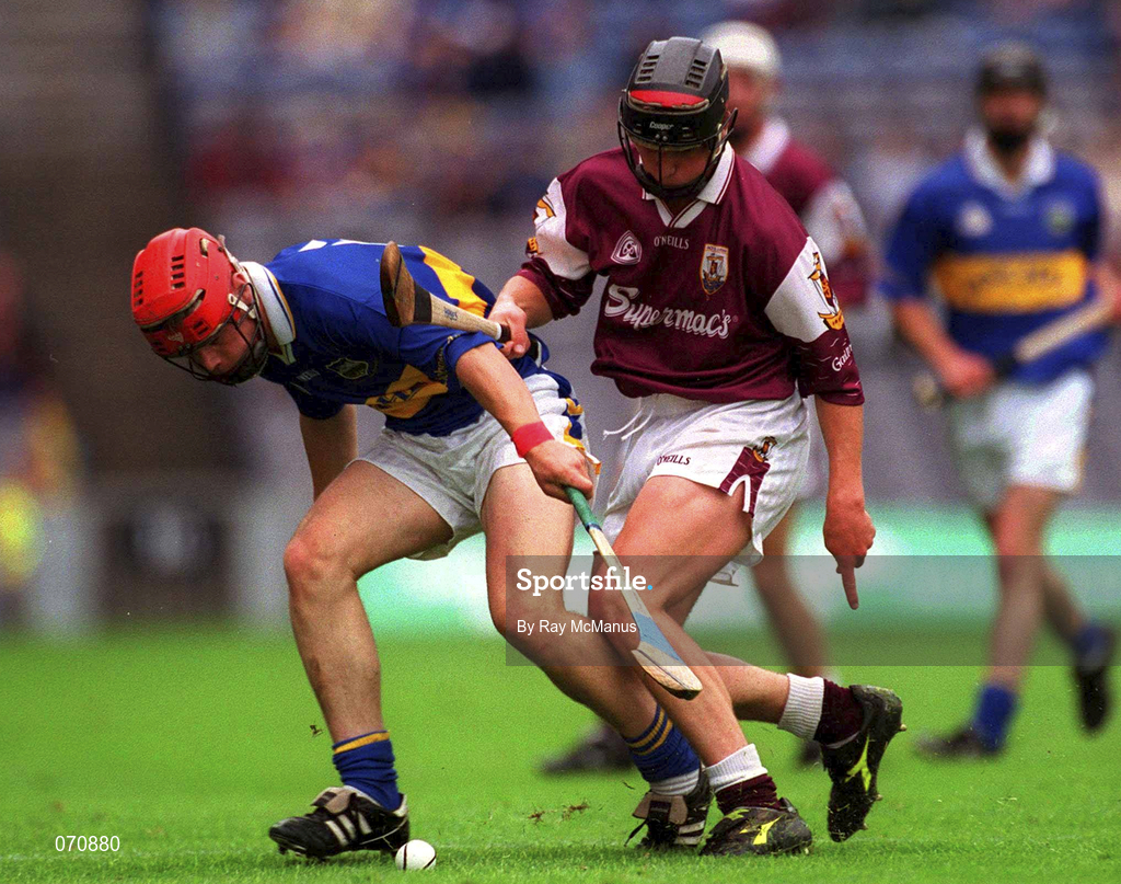 12 August 2001; Diarmuid Fitzgerald of Tipperary is tackled by Kevin Hayes of Galway during the All-Ireland Minor Hurling Championship Semi-Final between Galway and Tipperary at Croke Park in Dublin. Photo by Ray McManus/Sportsfile