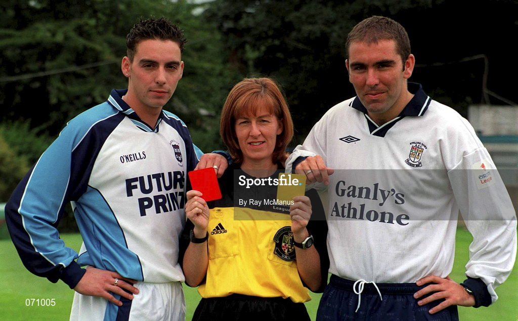 24 August 2001; At the announcement that eircom is to sponsor the Referees' Panel of the eircom League is Hilda McDermot with Robert Farrell of Dublin City, left, and Andy Myler of Athlone Town. Hilda is the first woman official to join the eircom League's Referees' Panel and runs the line at the Dublin City versus Athlone game on Saturday evening.  Hilda is the first woman official to join the eircom League's Referees' Panel and runs the line at the Dublin City versus Athlone game on Saturday evening. Photo by Ray McManus/Sportsfile
