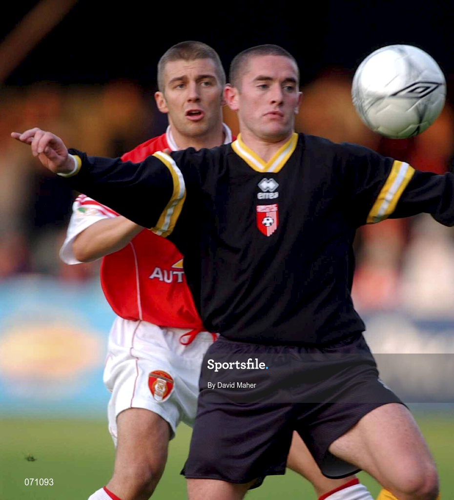 24 August 2001; Tommy McCallion of Derry City holds off the challange from Trevor Croly of St Patrick's Athletic during the Eircom League Premier Division match between St Patrick's Athletic and Derry City at Richmond Park in Dublin. Photo by David Maher/Sportsfile