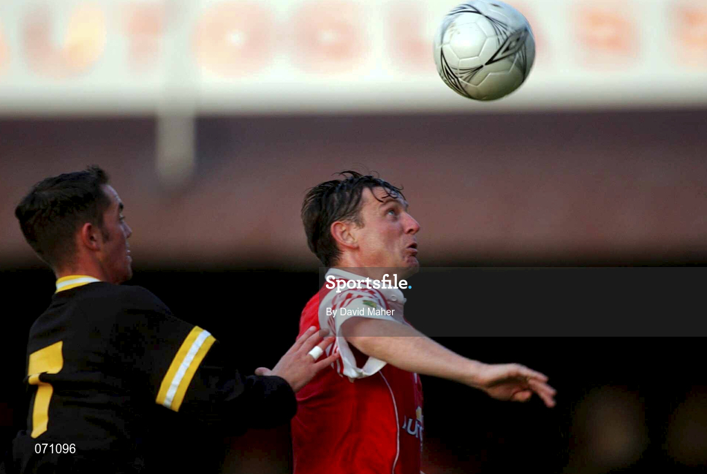 24 August 2001; Martin Russell of St Patrick's Athletic in action against Gary Beckett of Derry City during the Eircom League Premier Division match between St Patrick's Athletic and Derry City at Richmond Park in Dublin. Photo by David Maher/Sportsfile