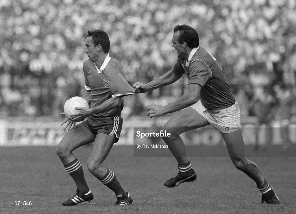 24 August 1986; Denis 'Ogie' Moran of Kerry in action against Mick Lyons of Meath during the All-Ireland Senior Football Championship Semi-Final match between Meath and Kerry at Croke Park in Dublin. Photo by Ray McManus/Sportsfile