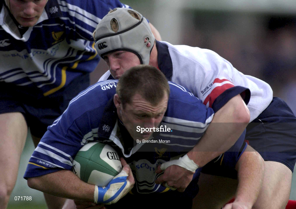 31 August 2001; Eric Miller of Leinster is tackled by Ulster's Neil McMillan during the Celtic League match between Leinster and Ulster at Donnybrook in Dublin. Photo by Brendan Moran/Sportsfile