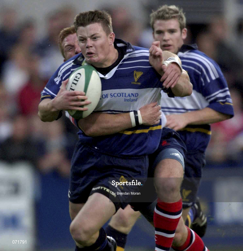 31 August 2001; Brian O'Driscoll of Leinster is tackled by Ulster's Jonathan Bell during the Celtic League match between Leinster and Ulster at Donnybrook in Dublin. Photo by Brendan Moran/Sportsfile