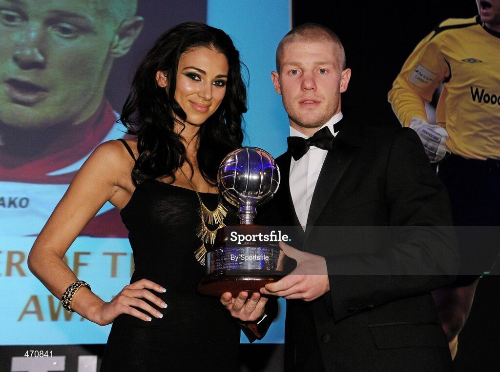 6 November 2010; Richie Ryan, Sligo Rovers, who won the PFAI Ford Player of the Year award, pictured receiving his award from Georgia Salpa. PFAI Ford 2010 Awards, The Burlington Hotel, Upper Leeson Street, Dublin. Photo by Sportsfile