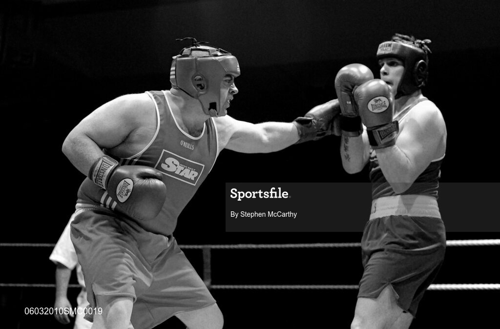 6 March 2010; Trevor Foley, Crumlin, left, exchanges punches with Jonathan York, Springhill, during their men's novice 91+kg bout. Men's Novice National Championships 2010 Finals - Saturday Afternoon Session, National Stadium, Dublin. Picture credit: Stephen McCarthy / SPORTSFILE