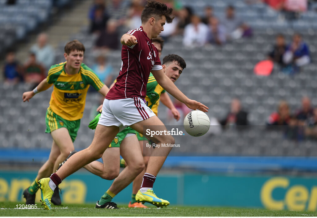 21 August 2016; Robert Finnerty of Galway shoots past Aaron McCrea of Donegal to score a goal in the 5th minute during the Electric Ireland GAA Football All-Ireland Minor Championship Semi-Final game between Donegal and Galway at Croke Park in Dublin. Photo by Ray McManus/Sportsfile