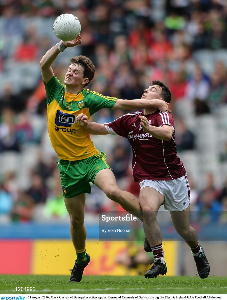 21 August 2016; Mark Curran of Donegal in action against Desmond Conneely of Galway during the Electric Ireland GAA Football All-Ireland Minor Championship Semi-Final game between Donegal and Galway at Croke Park in Dublin. Photo by Eóin Noonan/Sportsfile