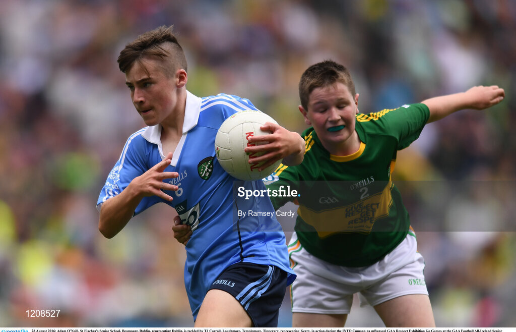 28 August 2016; Adam O'Neill, St Fiachra's Senior School, Beamount, Dublin, representing Dublin, is tackled by TJ Carroll, Loughmore, Templemore, Tipperary, representing Kerry, in action during the INTO Cumann na mBunscol GAA Respect Exhibition Go Games at the GAA Football All-Ireland Senior Championship Semi-Final game between Dublin and Kerry at Croke Park in Dublin. Photo by Ramsey Cardy/Sportsfile