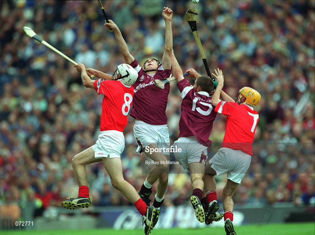 9 September 2001; Kevin Hartnett, 8, and Michael Prout of Cork in action against Johnnie Maher, left, and Kenneth Burke of Galway during the All-Ireland Minor Hurling Championship Final between Cork and Galway at Croke Park in Dublin. Photo by Ray McManus/Sportsfile
