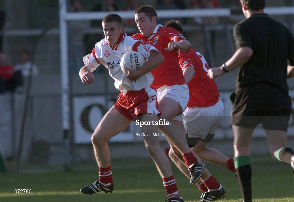 9 September 2001; Noel O'Leary of Cork tackles Philip Jordan of Tyrone during the All-Ireland Under 21 Football Championship Semi-Final match between Tyrone and Cork at Parnell Park in Dublin. Photo by David Maher/Sportsfile