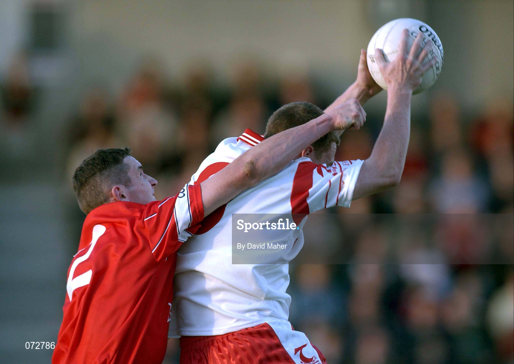 9 September 2001; Cormac McAnallen of Tyrone in action against Graham Canty of Cork during the All-Ireland Under 21 Football Championship Semi-Final match between Tyrone and Cork at Parnell Park in Dublin. Photo by David Maher/Sportsfile