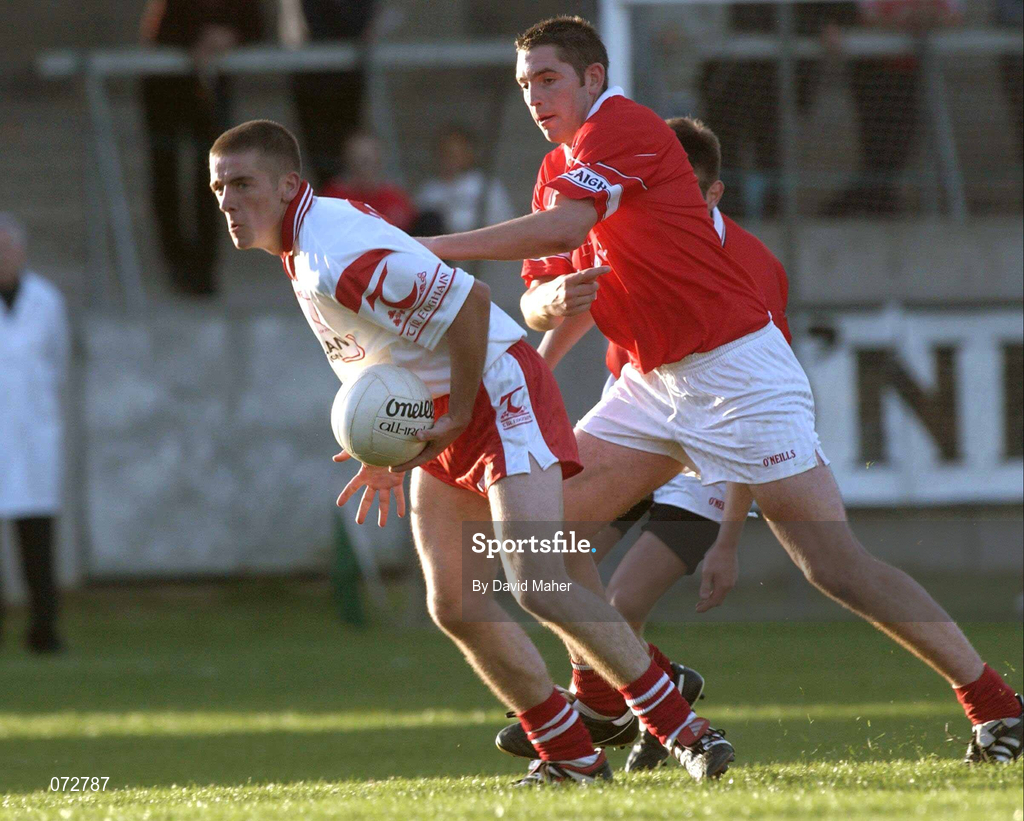 9 September 2001; Philip Jordan of Tyrone in action against Noel O'Leary of Cork during the All-Ireland Under 21 Football Championship Semi-Final match between Tyrone and Cork at Parnell Park in Dublin. Photo by David Maher/Sportsfile