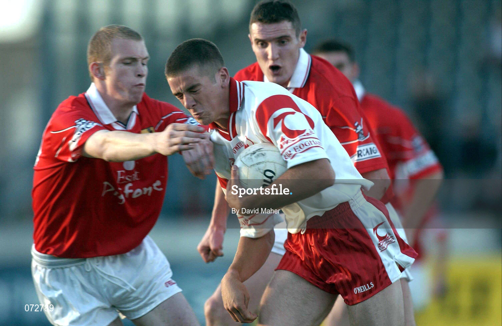9 September 2001; Philip Jordan of Tyrone in action against Dillon Meeghan and Graham Canty of Cork during the All-Ireland Under 21 Football Championship Semi-Final match between Tyrone and Cork at Parnell Park in Dublin. Photo by David Maher/Sportsfile