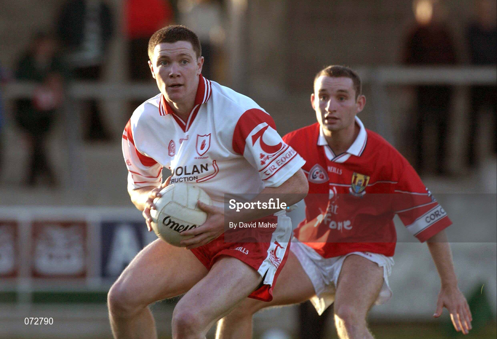 9 September 2001; Enda McGinley of Tyrone in action against Diarmuid Duggan of Cork during the All-Ireland Under 21 Football Championship Semi-Final match between Tyrone and Cork at Parnell Park in Dublin. Photo by David Maher/Sportsfile