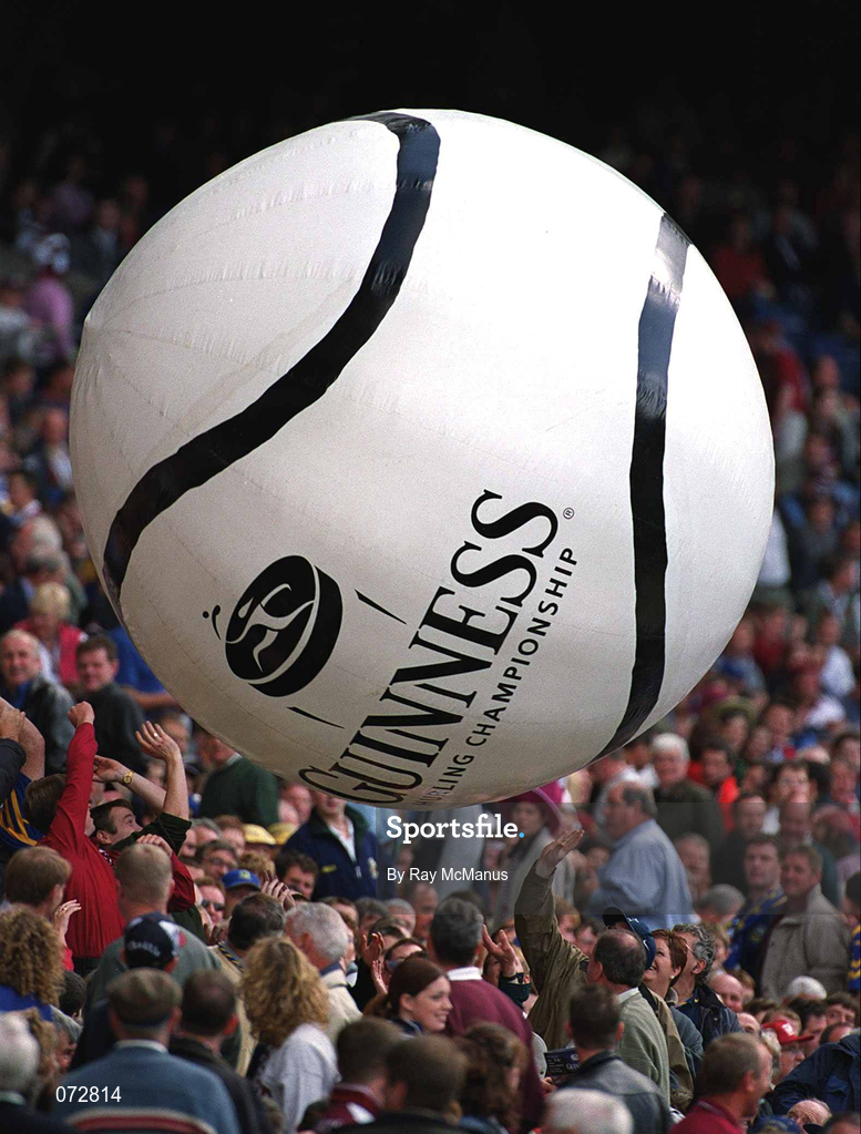 9 September 2001; Tipperary and Galway supporters punch the giant Guinness sliothar during half-time of the Guinness All-Ireland Senior Hurling Championship Final match between Tipperary and Galway at Croke Park in Dublin. Photo by Ray McManus/Sportsfile