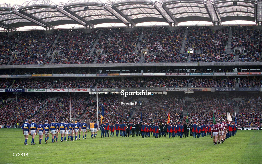 9 September 2001; The Tipperary and Galway teams, led by the Artane band, walk towards the Canal end during the pre-match parade prior to the Guinness All-Ireland Senior Hurling Championship Final match between Tipperary and Galway at Croke Park in Dublin. Photo by Aoife Rice/Sportsfile