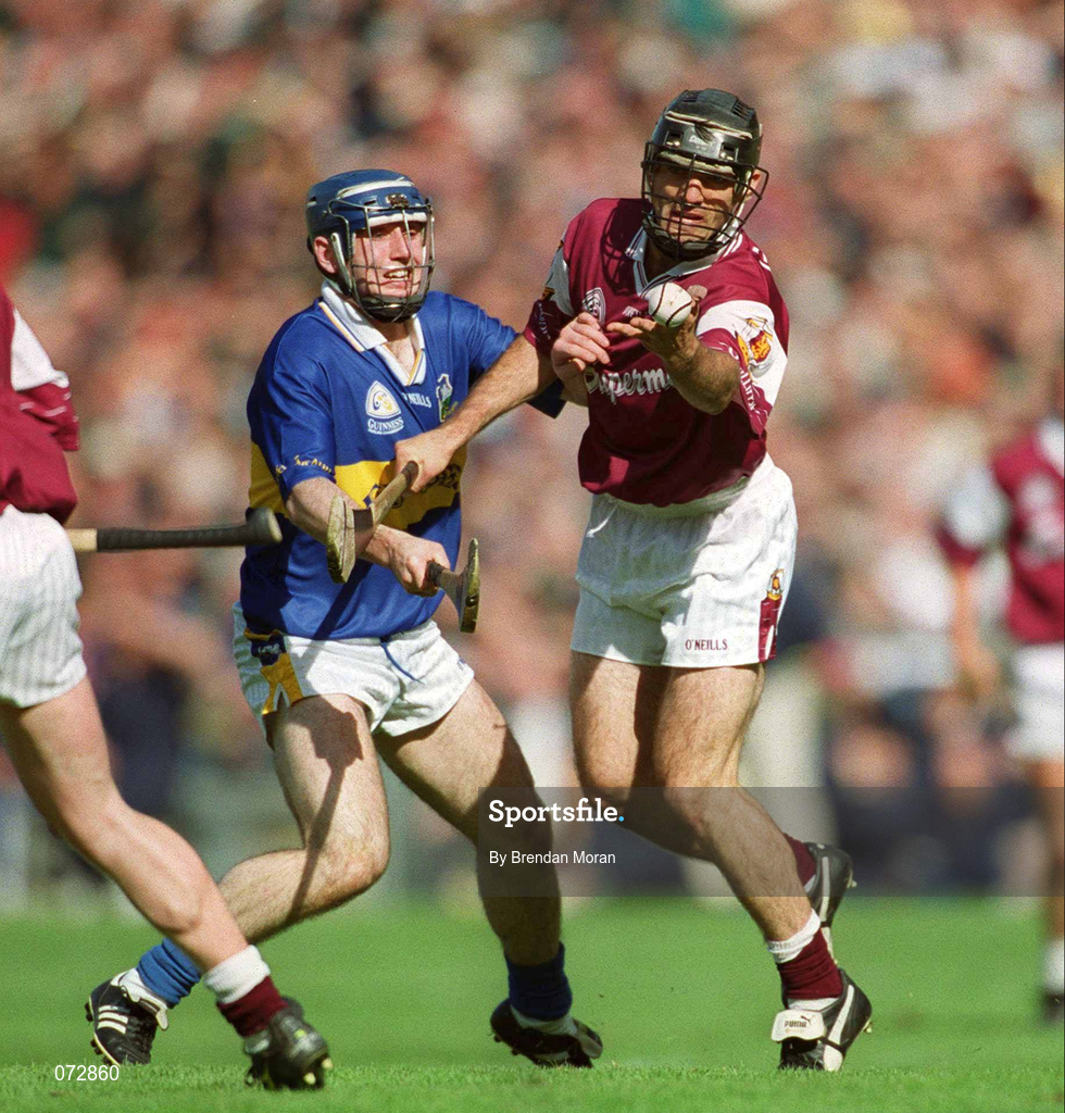 9 September 2001; Michael Healy of Galway in action against Eoin Kelly of Tipperary during the Guinness All-Ireland Senior Hurling Championship Final match between Tipperary and Galway at Croke Park in Dublin. Photo by Brendan Moran/Sportsfile