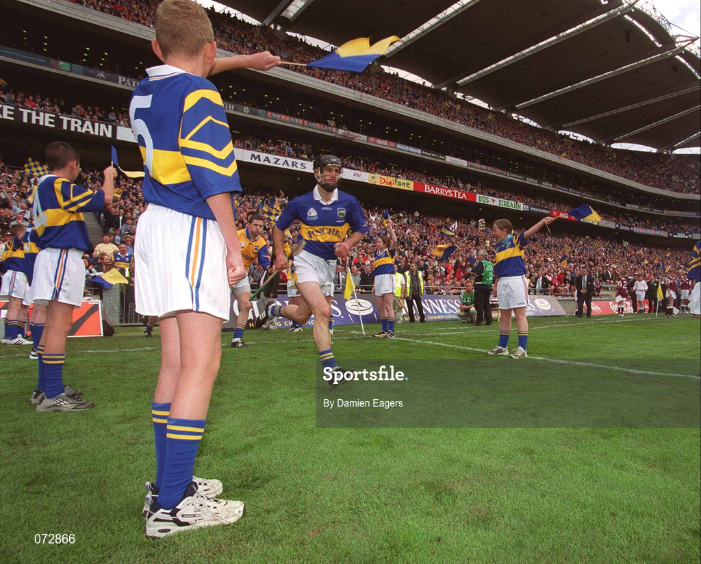 9 September 2001; Tipperary capatain Thomas Dunne runs onto the pitch prior to the Guinness All-Ireland Senior Hurling Championship Final match between Tipperary and Galway at Croke Park in Dublin. Photo by Damien Eagers/Sportsfile
