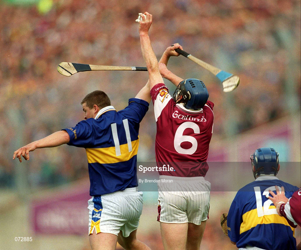 9 September 2001; Liam Hodgins of Galway wins the sliothar ahead of John Carroll of Tipperary during the Guinness All-Ireland Senior Hurling Championship Final match between Tipperary and Galway at Croke Park in Dublin. Photo by Brendan Moran/Sportsfile