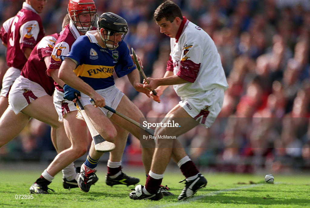 9 September 2001; Mark O'Leary of Tipperary puts the sliotar past Galway goalkeeper Michael Crimmins to score a goal  during the Guinness All-Ireland Senior Hurling Championship Final match between Tipperary and Galway at Croke Park in Dublin. Photo by Ray McManus/Sportsfile