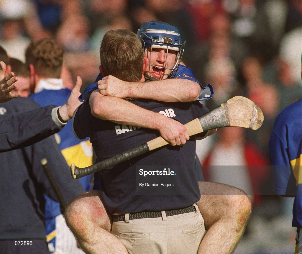 9 September 2001; Eoin Kelly celebrates with Tipperary manager Nicky English following their victory in the Guinness All-Ireland Senior Hurling Championship Final match between Tipperary and Galway at Croke Park in Dublin. Photo by Damien Eagers/Sportsfile