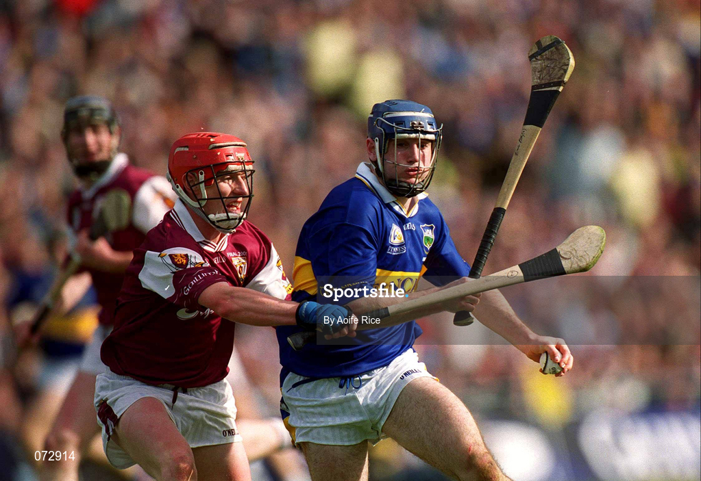 9 September 2001; Eoin Kelly of Tipperary in action against Ollie Canning of Galway during the Guinness All-Ireland Senior Hurling Championship Final match between Tipperary and Galway at Croke Park in Dublin. Photo by Aoife Rice/Sportsfile
