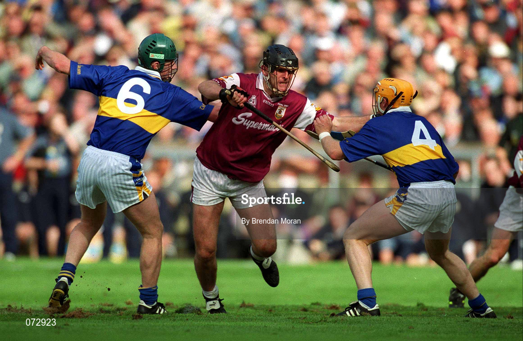 9 September 2001; Joe Rabbitte of Galway in action against David Kennedy, left, and Paul Ormonde of Tipperary during the Guinness All-Ireland Senior Hurling Championship Final match between Tipperary and Galway at Croke Park in Dublin. Photo by Brendan Moran/Sportsfile