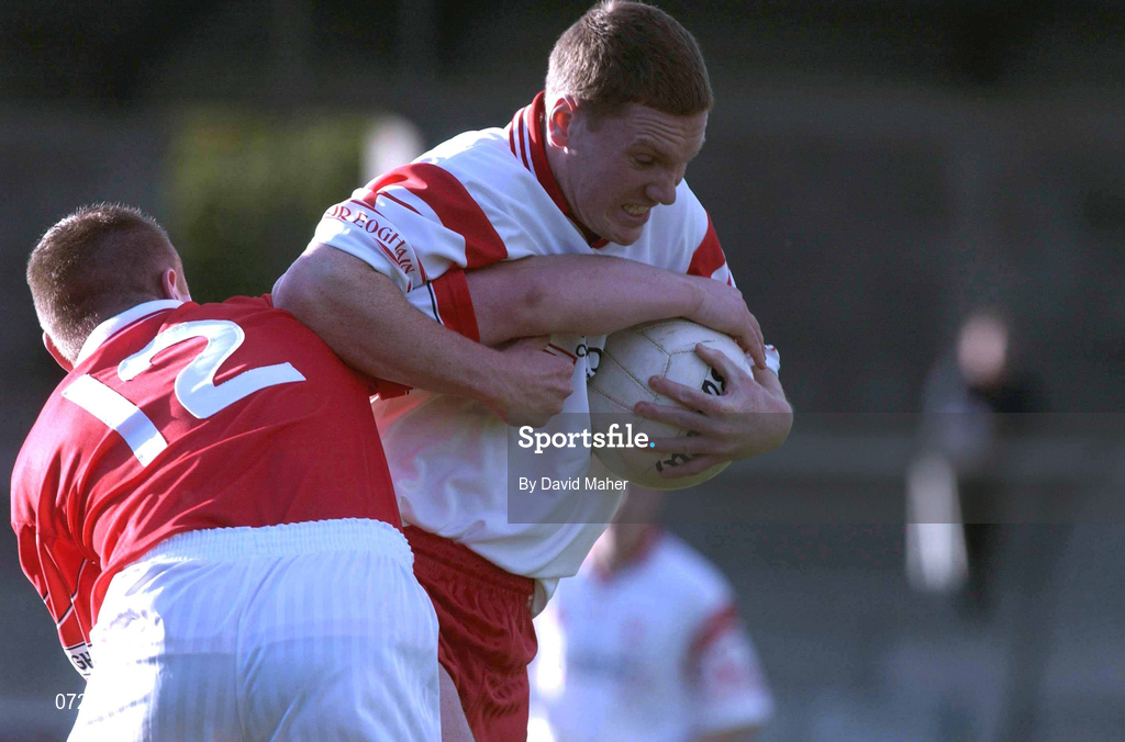 9 September 2001; Paudie Hurley of Cork is tackled by Cormac McAnallen of Tyrone during the All-Ireland Under 21 Football Championship Semi-Final match between Tyrone and Cork at Parnell Park in Dublin. Photo by David Maher/Sportsfile