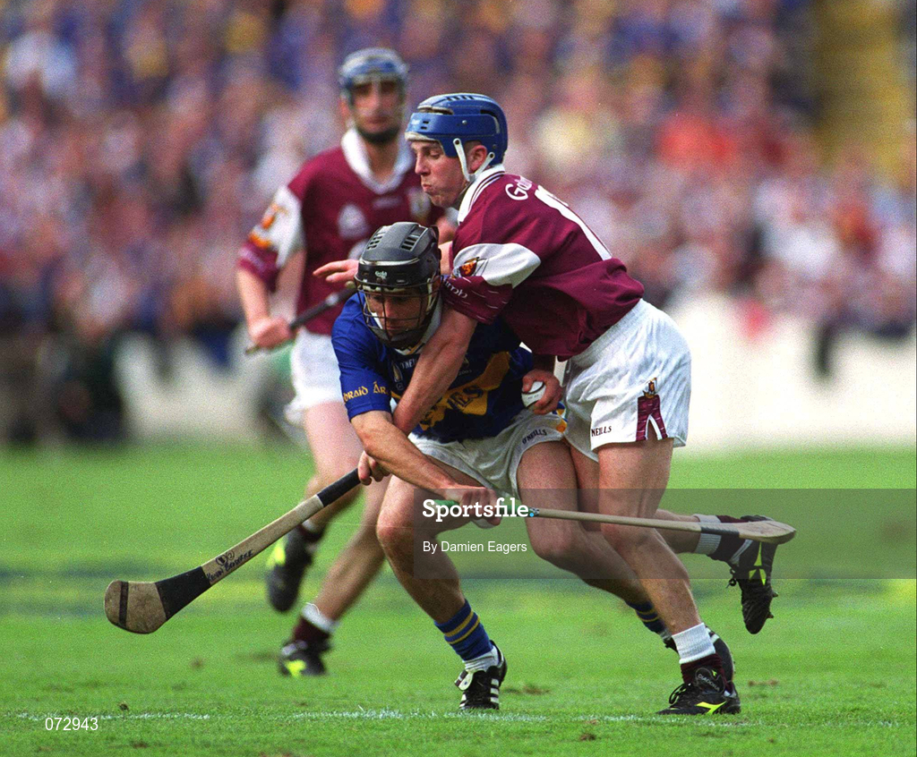 9 September 2001; Thomas Dunne of Tipperary in action against Kevin broderick of Galway during the Guinness All-Ireland Senior Hurling Championship Final match between Tipperary and Galway at Croke Park in Dublin. Photo by Damien Eagers/Sportsfile