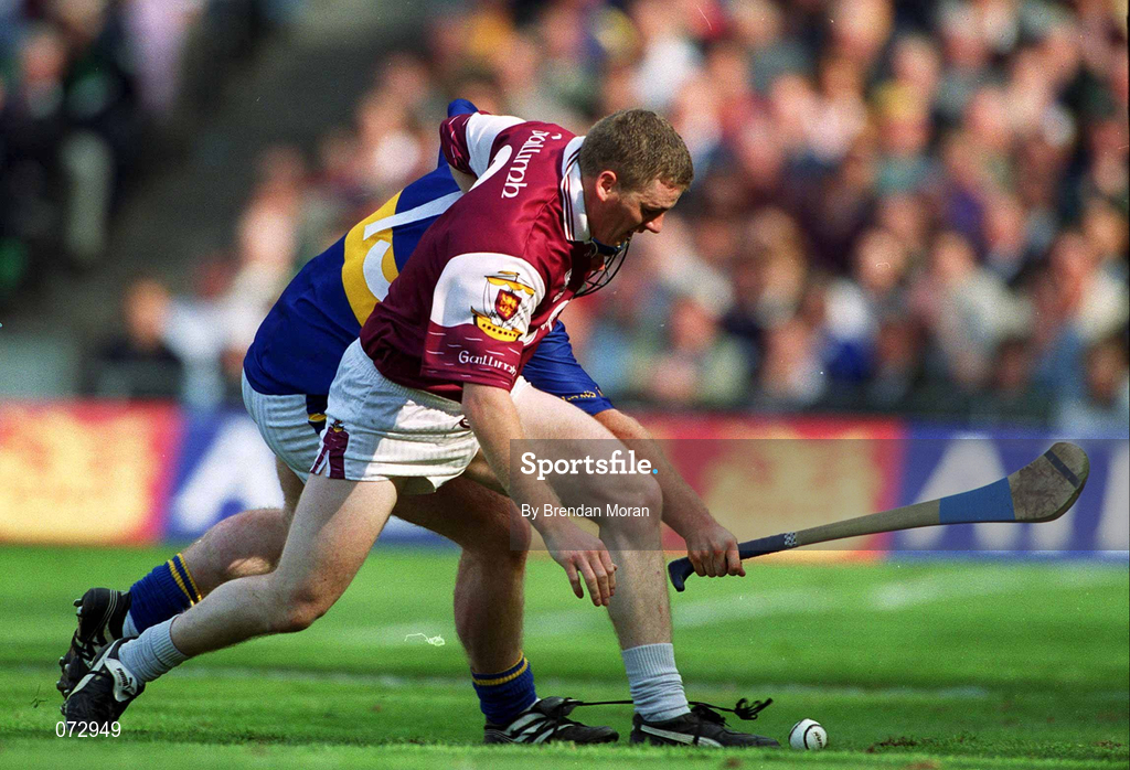 9 September 2001; Gregory Kennedy of Galway in action against Eugene O'Neill of Tipperary during the Guinness All-Ireland Senior Hurling Championship Final match between Tipperary and Galway at Croke Park in Dublin. Photo by Brendan Moran/Sportsfile