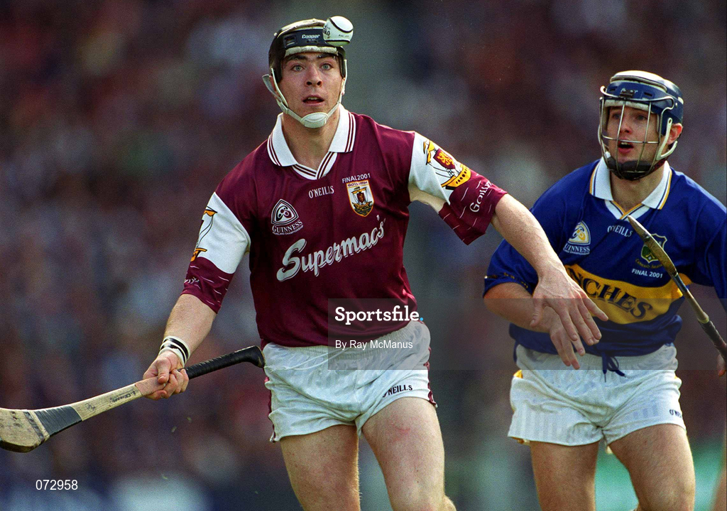 9 September 2001; Eugene Cloonan of Galway in action against Paul Kelly of Tipperary during the Guinness All-Ireland Senior Hurling Championship Final match between Tipperary and Galway at Croke Park in Dublin. Photo by Ray McManus/Sportsfile