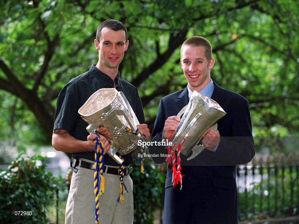 10 September 2001; Tipperary captain Thomas Dunne, left, with the Liam MacCarthy cup, and Cork minor captain Tomas O'Leary with the Irish Press trophy outside the Burlington Hotel following their side's success in the All-Ireland Senior and Minor Hurling Championship Finals. Photo by Brendan Moran/Sportsfile