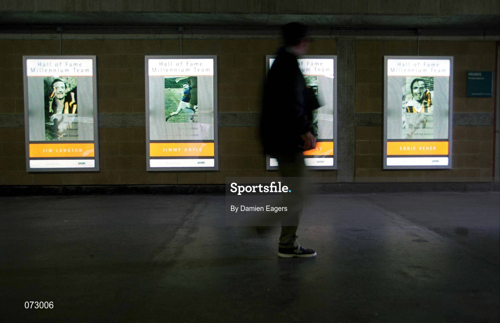 9 September 2001; A supporter walks past the wall displaying the hurling Team of the Millenium during the Guinness All-Ireland Senior Hurling Championship Final match between Tipperary and Galway at Croke Park in Dublin. Photo by Damien Eagers/Sportsfile