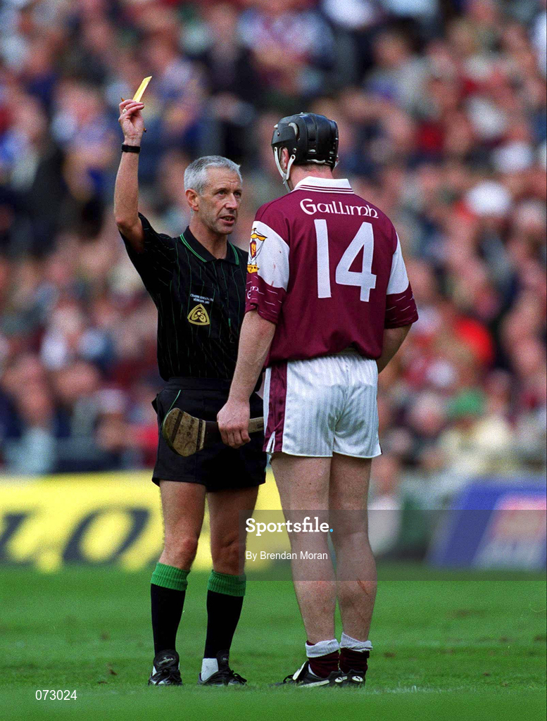 9 September 2001; Referee Pat O'Connor issues a yellow card to Eugene Cloonan of Galway during the Guinness All-Ireland Senior Hurling Championship Final match between Tipperary and Galway at Croke Park in Dublin. Photo by Brendan Moran/Sportsfile