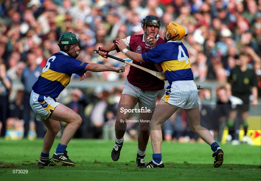 9 September 2001; Joe Rabbitte of Galway is tackled by David Kennedy, left, and Paul Ormonde of Tipperary during the Guinness All-Ireland Senior Hurling Championship Final match between Tipperary and Galway at Croke Park in Dublin. Photo by Brendan Moran/Sportsfile