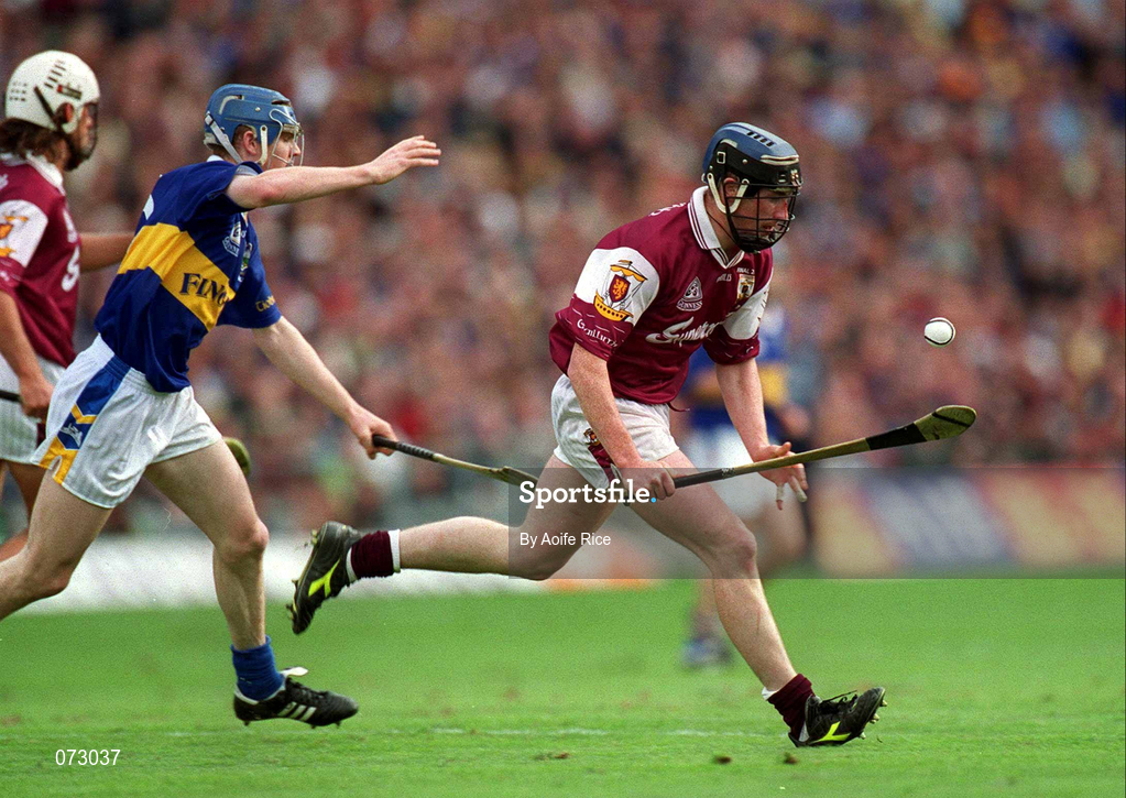 9 September 2001; Liam Hodgins of Galway races away from Lar Corbett of Tipperary during the Guinness All-Ireland Senior Hurling Championship Final match between Tipperary and Galway at Croke Park in Dublin. Photo by Aoife Rice/Sportsfile