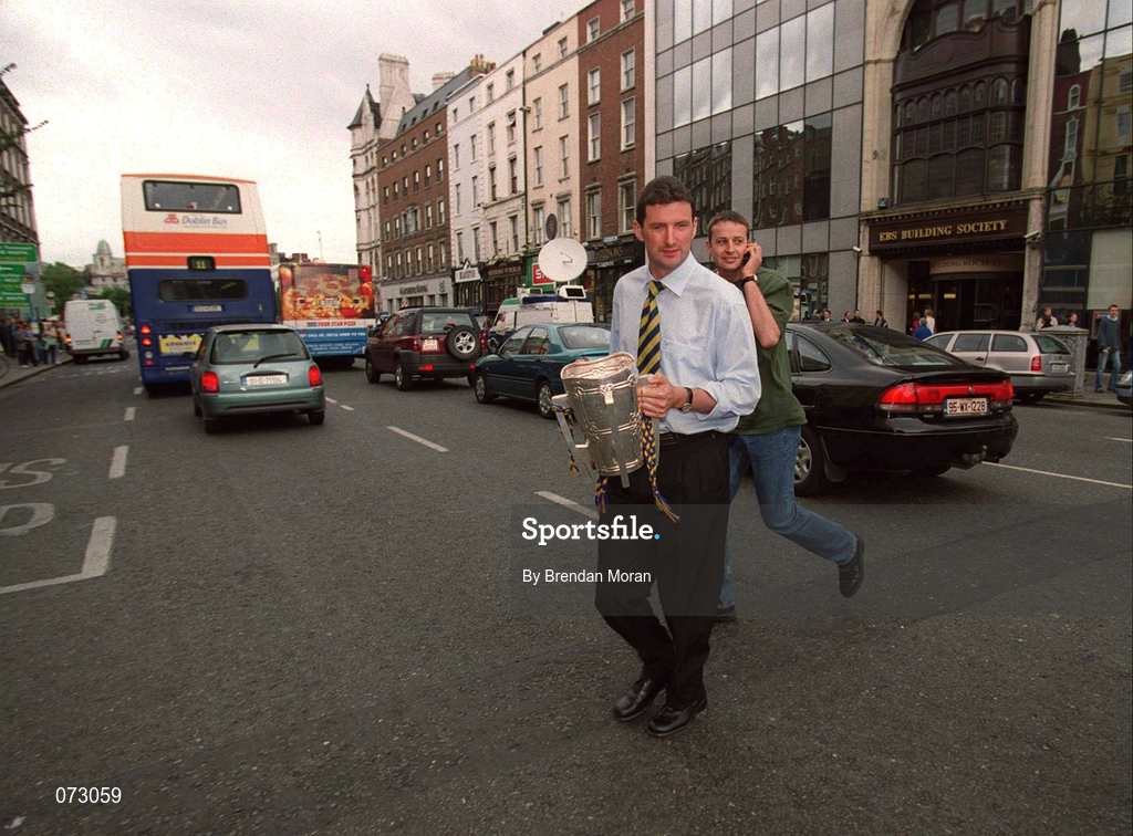 10 September 2001; Tipperary goalkeeper Brendan Cummins  crosses Westmoreland St in Dublin, with the Liam MacCarthy cup, after his side had been victorious in the All-Ireland Hurling Final where they defated Galway. Photo by Brendan Moran/Sportsfile