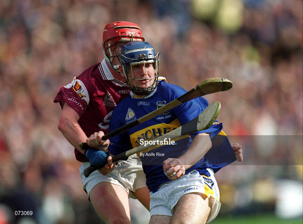 9 September 2001; Eoin Kelly of Tipperary in action against Ollie Canning of Galway during the Guinness All-Ireland Senior Hurling Championship Final match between Tipperary and Galway at Croke Park in Dublin. Photo by Aoife Rice/Sportsfile