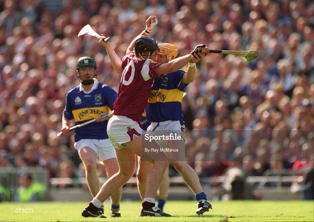 9 September 2001; Joe Rabbitte of Galway is tackled by Paul Kelly of Tipperary during the Guinness All-Ireland Senior Hurling Championship Final match between Tipperary and Galway at Croke Park in Dublin. Photo by Ray McManus/Sportsfile