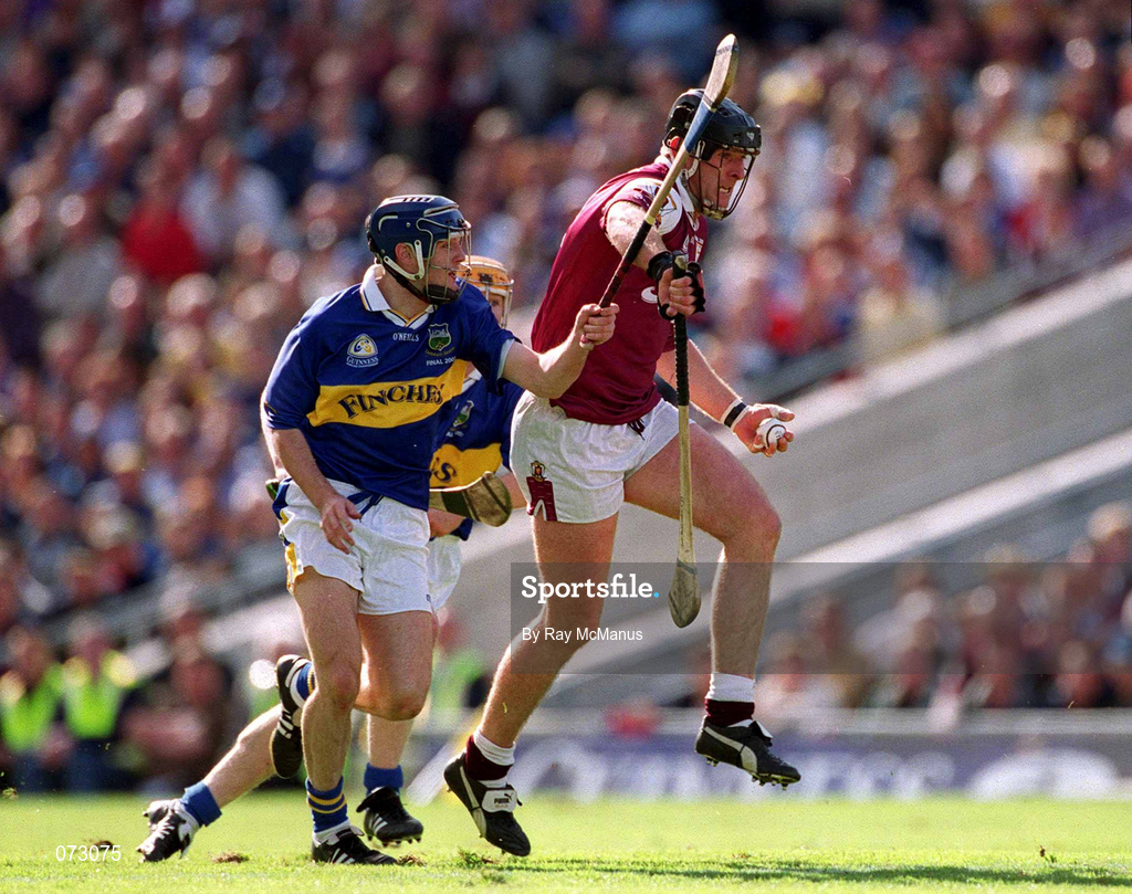 9 September 2001; Joe Rabbitte of Galway is tackled by Paul Kelly of Tipperary during the Guinness All-Ireland Senior Hurling Championship Final match between Tipperary and Galway at Croke Park in Dublin. Photo by Ray McManus/Sportsfile