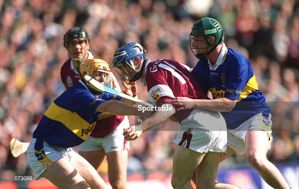 9 September 2001; Mark Kerins of Galway in action against David Kennedy, right, and Eamonn Corcoran of Tipperary during the Guinness All-Ireland Senior Hurling Championship Final match between Tipperary and Galway at Croke Park in Dublin. Photo by Aoife Rice/Sportsfile