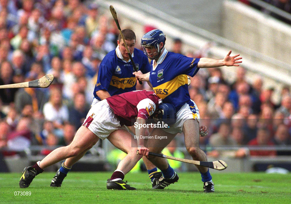 9 September 2001; Liam Hodgins of Galway in action against Eoin Kelly of Tipperary during the Guinness All-Ireland Senior Hurling Championship Final match between Tipperary and Galway at Croke Park in Dublin. Photo by Damien Eagers/Sportsfile